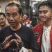 Kunjungi Lampung, Jokowi Kenakan Kemeja dan Topi Logo PSI